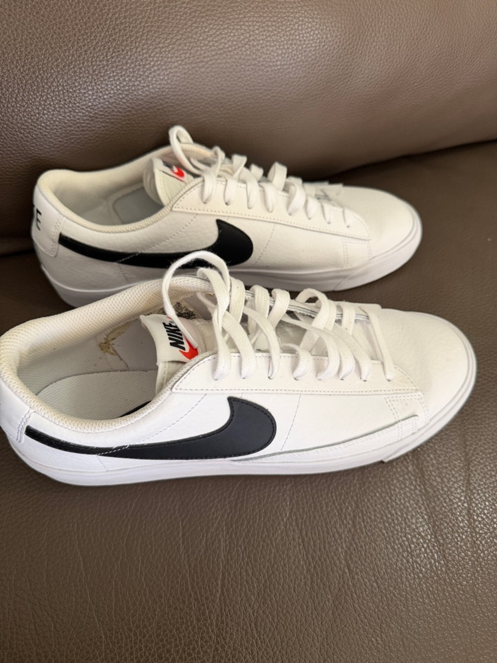 Nike Men’s White Sneakers with Black Swoosh and Red Tongue Logo - Picture 2 of 7